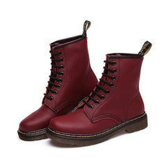 Platta lågklackade brittiska Martin-stövlar i röret Par Korta stövlar i läder 